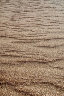 Brown-gold natural sand texture texture background, waves wallpaper background beach coast