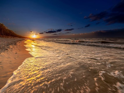 Sunset on a sandy beach on the island of Usedom on the Baltic Sea, Zempin, Mecklenburg-Western
