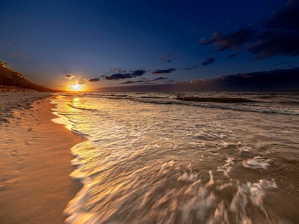 Sunset on a sandy beach on the island of Usedom on the Baltic Sea, Zempin, Mecklenburg-Western