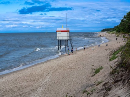 DLRG stand on the beach, sandy beach, clouds in the blue sky on the island of Usedom on the Baltic