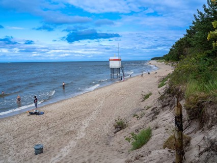 DLRG stand on the beach, sandy beach, clouds in the blue sky on the island of Usedom on the Baltic