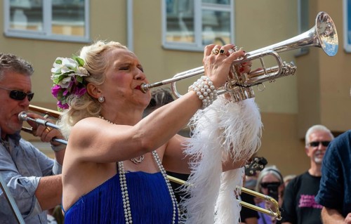 Jazz musicians, The Carling family, play on the street in Ystad in the opening of the Ystad Jazz
