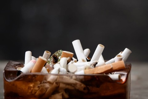 Ashtray with cigarette butts, Germany, Europe
