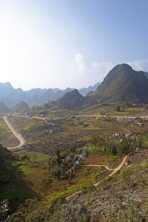 Road and karst hills in the Dong Van Karst Plateau UNESCO Global Geopark, Ha Giang Province,