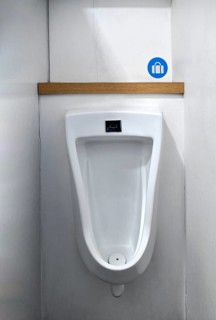 Urinal with bag holder