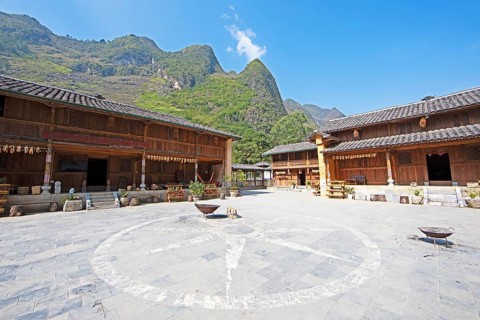 Traditional houses on the village square, Pa Vi Hmong Cultural Village, Meo Vac, Ha Giang Province,