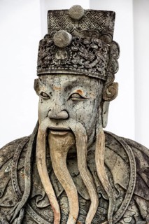 Chinese guardian figure at Wat Pho complex, Bangkok, Thailand, Asia