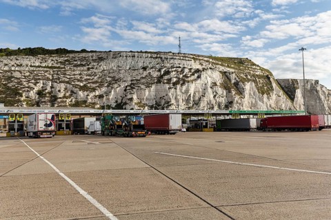 Trucks waiting in the ferry terminal, chalk cliffs, Dover, Kent, England, United Kingdom, Europe