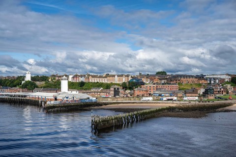 North bank of the River Tyne, fish market on the left with the Old Low lighthouse on the right and