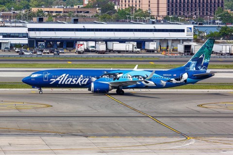 A Boeing 737-9 MAX aircraft of Alaska Airlines with the registration number N932AK and the West