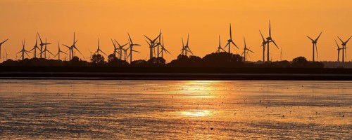 Mudflat landscape and many wind turbines in the marshland, North Sea, Norddeich, Norden, East