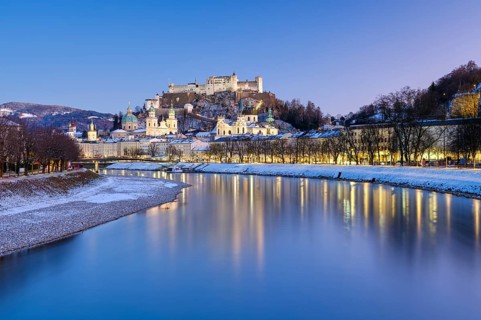 Salzburg in winter at the blue hour, Old Town, Cathedral, Fortress Hohen Salzburg, Salzach,
