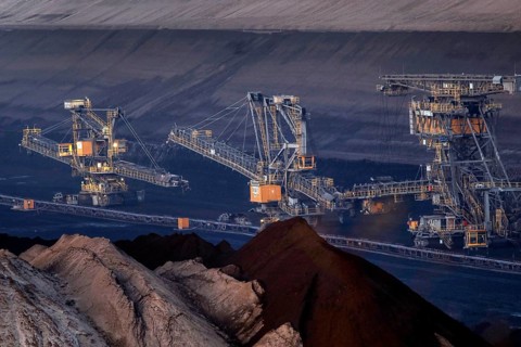 Lignite excavators extract coal in the Welzow open-cast mine, operated by LEAG. The lignite is