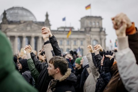 People hold hands at the large demonstration against the right in Berlin under the slogan We are