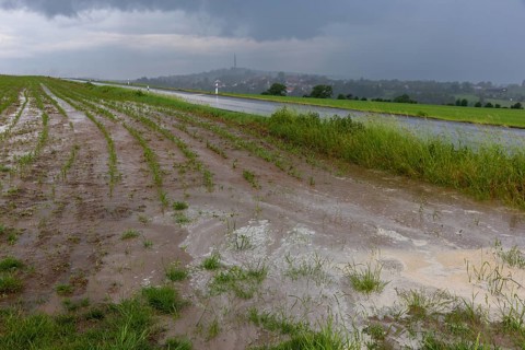 Heavy rain showers and thunderstorms pass over Possendorf in the Eastern Ore Mountains. Flooded