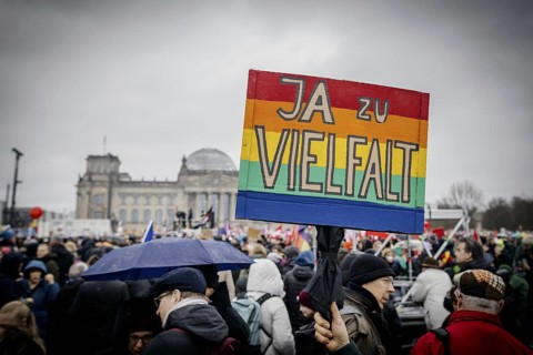 Posters at the large demonstration against the right in Berlin under the slogan We are the firewall