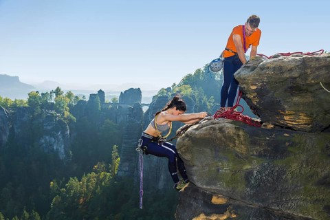 Climbers in Rathen in Saxon Switzerland