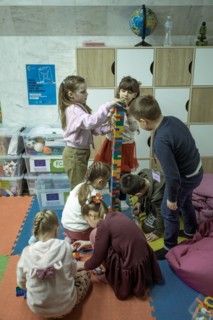 Pupils in a classroom in one of the metro schools in Kharkiv. Classrooms were set up in various