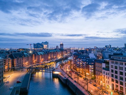 Aerial view of Speicherstadt Hamburg and the Elbe Philharmonic Hall with customs canal at blue
