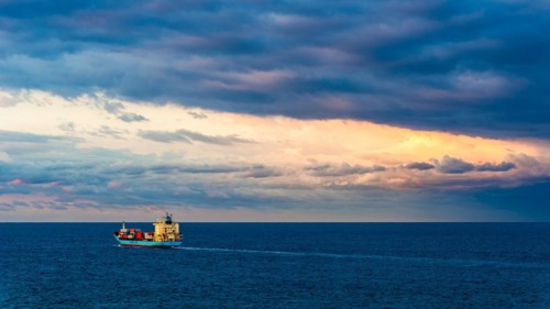 Maersk Line Container Ship on sea at sunrise, Barcelona, Spain, Europe