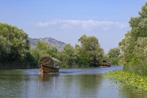 Tourist boats near Virpazar on the Crmnica river which flows into Skadar Lake, Skadarsko Jezero
