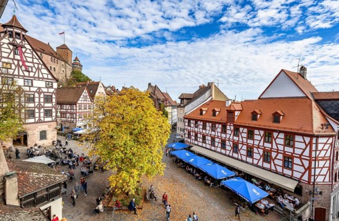 Square at the TiergÃ¤rtnertor with half-timbered houses, Pilatus House, at the Kaiserburg, in