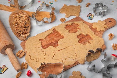 Biscuit baking, cutting out biscuits for New Year, shamrocks and pigs, baking accessories