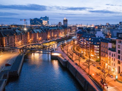 Aerial view of Speicherstadt Hamburg and the Elbe Philharmonic Hall with customs canal at blue