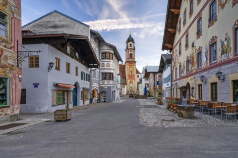 Bell tower of the parish churches of St Peter and St Paul, house façades with air frescoes,