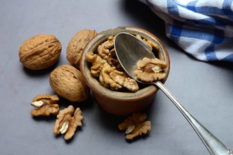 Walnut, walnuts in pots with spoon, Juglans regia