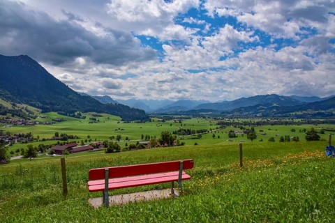 Resting bench on the Gebhardshöhe above the municipality of Rettenberg in AllgÃ¤u, Bavaria,