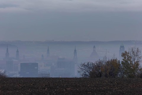 View from Dresden's Südhöhe of the city centre with its towers sinking into the fog