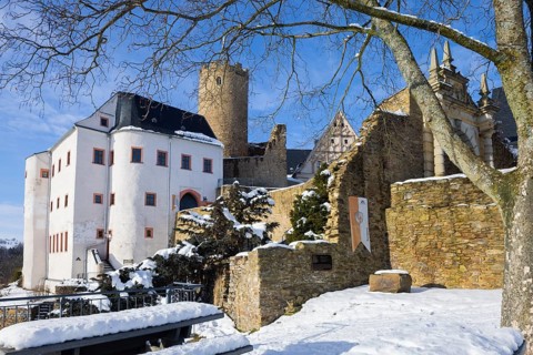 Scharfenstein Castle is a Spornburg on an elongated spur above the village of Scharfenstein