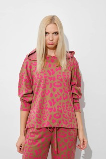 Upset, sad woman in pink pyjama on white background
