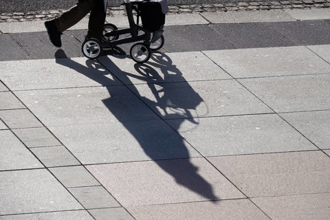 Passers-by with rollator, shadow, winter, Saxony, Germany, Europe