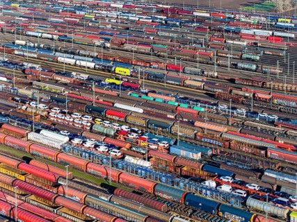 Deutsche Bahn AG marshalling yard. Many goods trains are parked on the tracks with tank wagons, car