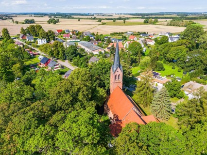 Aerial view, drone photo of Krummin village church and village, Krumminer Wiek on the Peenestrom,