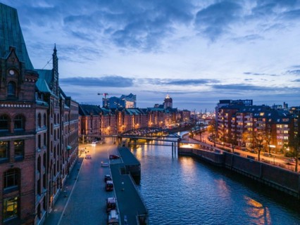 Aerial view of Speicherstadt Hamburg and the Elbe Philharmonic Hall with customs canal at blue