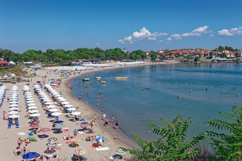 Beach with beach huts, restaurants and cafés on the Bay of Burgas on the Black Sea. Sozopol,