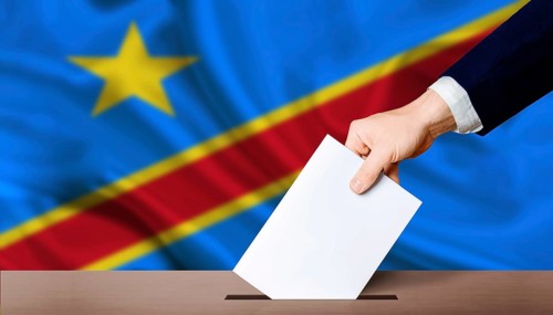 Presidential elections of the Democratic Republic of the Congo. Hand holding ballot in voting