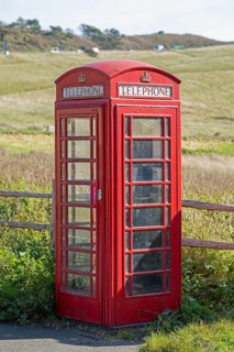 Traditional red telephone box, Cuckmere Haven, Seven Sisters, East Sussex, England, Great Britain