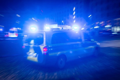 A police vehicle in action, with blue light switched on, Dresden, Saxony, Germany, Europe