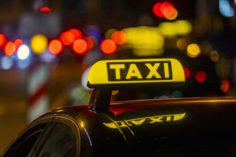 Illuminated taxi sign in the evening, symbolic photo, Stuttgart, Baden-Württemberg, Germany, Europe