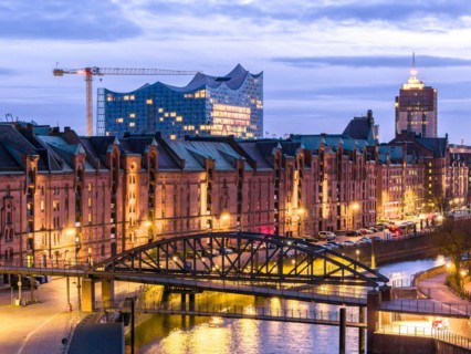 Aerial view of Speicherstadt Hamburg and the Elbe Philharmonic Hall with customs canal at blue