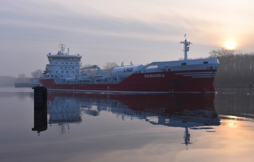 LNG tanker travelling through the Kiel Canal at fog and sunrise, Kiel Canal, Schleswig-Holstein,