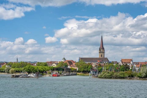 View of the harbour entrance from WÃ¤schbruckhafen and the Radolfzell Minster, Radolfzell on Lake
