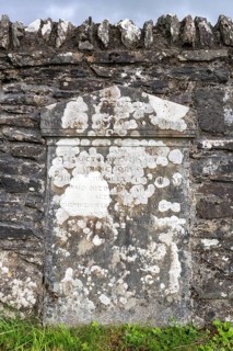 Old, weathered gravestone on the cemetery wall in Kilmartin, Argyll and Bute, Scotland, Great