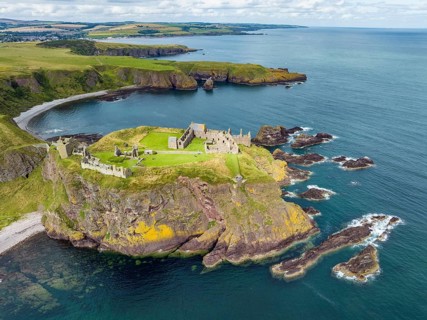 Aerial view of Dunnottar Castle ruins on the North Sea coast, Stonehaven, Aberdeenshire, Scotland,