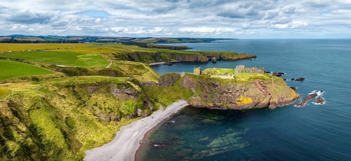 Aerial panorama of Dunnottar Castle ruins on the North Sea coast, Stonehaven, Aberdeenshire,