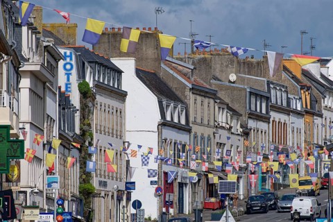 Residences and shops on the Avenue de la Gare in the centre of Concarneau. Brittany, Finistere,